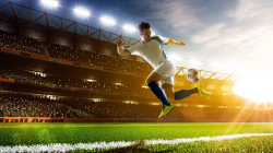 bek tengah sepak bola sedang bertahan di pertandingan